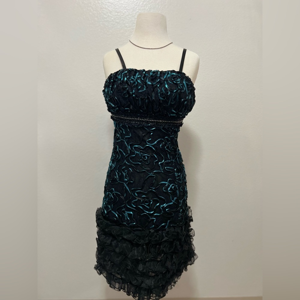 Night mini party dress. Black and green color